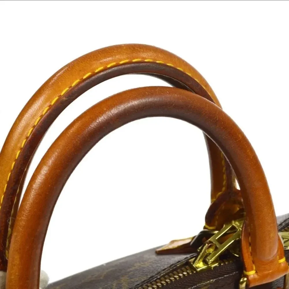 Louis Vuitton Alma Monogram Handbag - Picture 3 of 10